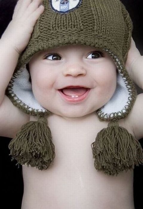 http://de.acidcow.com/pics/20101119/cute_baby_photos_05.jpg