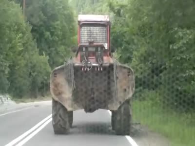 http://de.acidcow.com/pics/20120720/video/polish_tractor_driver.jpg